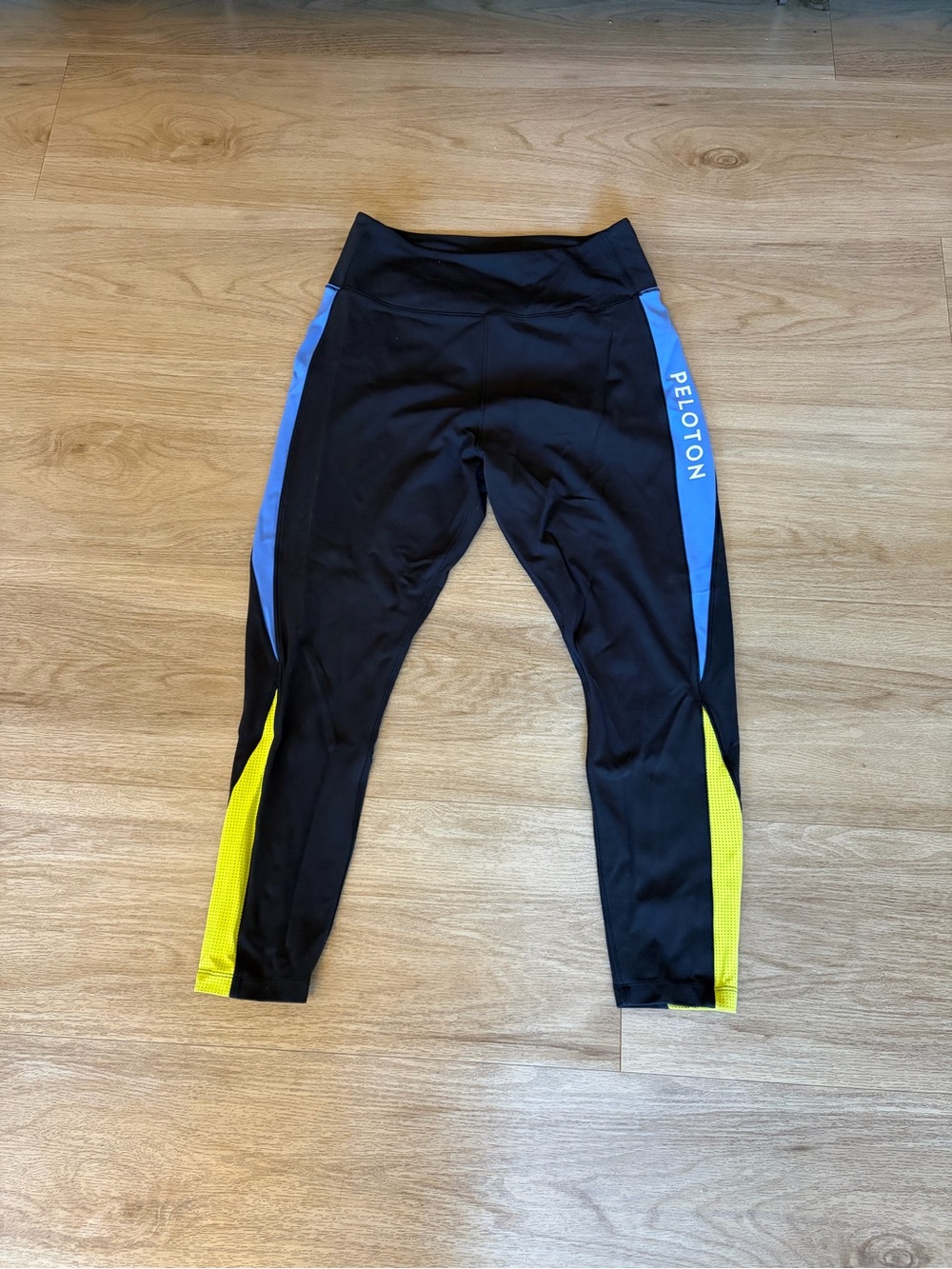 Peloton Black Leggings with Blue and Yellow Color-Block Panels